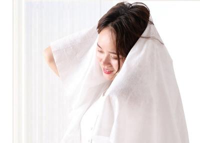 China Algodão 100% liso não tecido descartável ambiental da toalha de rosto de Spunlace nontoxic à venda