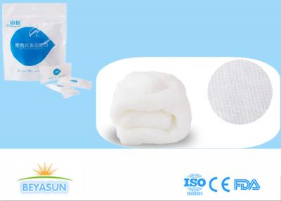 China Las toallas de mano disponibles comprimidas para el cuarto de baño/la toalla mojada inmediata acuñan el tejido en venta