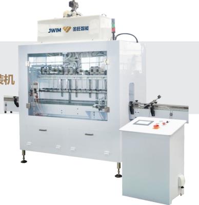 China Anti Corrosion Gravity Liquid Filling Machine Fertilizer Packaging Machine 1000ml To 5000ml for sale