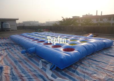 China OEM 8*4m PVC Tarpaulin Inflatable Running Sport Games With Many Red Hole Obstacles for sale
