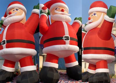 China Papá Noel inflable gigante de Navidad al aire libre con ventilador para decoraciones navideñas en venta
