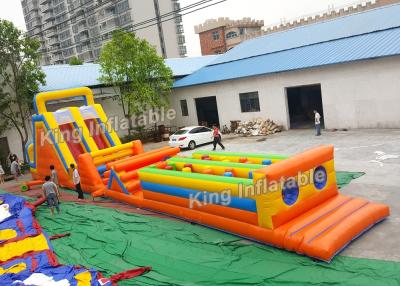 China Long Shape Orange Tunnel Inflatable Sport Games Obstacle And Slide For Kids for sale