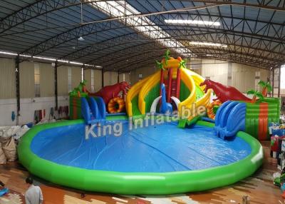 China Dinosaur Amusement Park Slide Amazing Inflatable Water Park With Swimming Pool for sale
