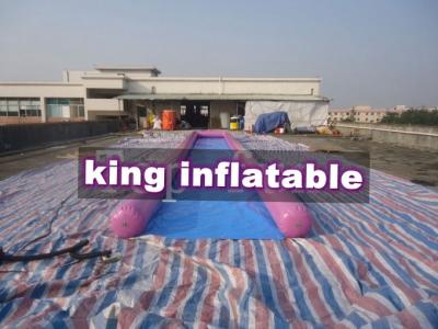 China Diapositiva/círculo/gota grandes inflables púrpuras/del azul 0.9m m del PVC del aire para la diversión del agua en venta