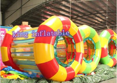 China Rodillo inflable divertido colorido del agua del PVC del juguete 1.0m m del agua para el juego graciosamente del agua en venta