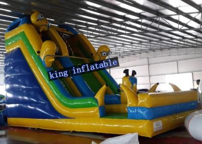 China 0.55mm PVC Tarpaulin Minions Inflatable Castle Dry Slide With Cartoon Printings for sale