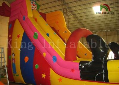 China 7*4*5.5m Inflatable Dry Slide Clown Theme PVC Bounce Houses For Kids for sale