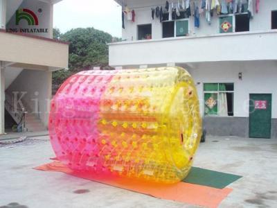 China Amusement Park Inflatable Water Floated Roller Toy For Summer Playing Water Games for sale