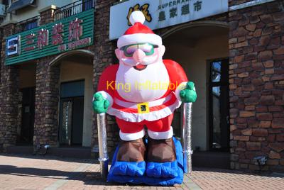 China 3m Opblaasbare Santa Claus Skiing Dancing Skateboarding Te koop