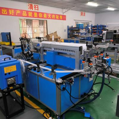 China High-speed Car Ac filter making machine 420 Pieces / 1 Hour and Scraping height 10~50mm for sale