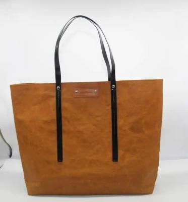 China Letter Pattern Washable Kraft Paper Tote Bag Degradable Environmental With Logo Printed for sale