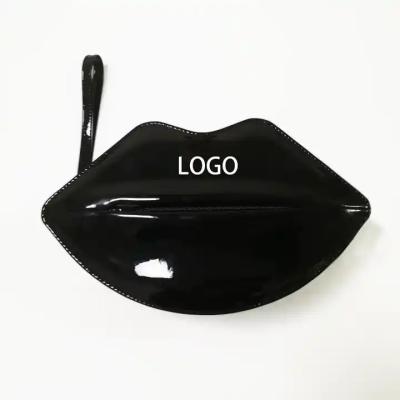 China Custom Fluorescent Black Lip Shaped Cosmetic Bag Luxury PU Shinny Cosmetic Gift Bag for sale
