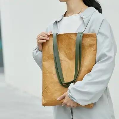 China Brown Tyvek Paper Washable Tote Bags Sustainable Bio Degradable With Leather Handle Strap for sale