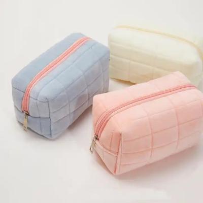 China Pink Purple Yellow White Puffer Travel Organizer Soft Quilted Plush Makeup Brush Cosmetics Pouch Pink Puffy Toiletry bag for sale