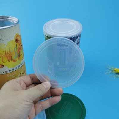 China Recycling Paper Cylinder Debossed 73mm Custom Plastic Lids for sale
