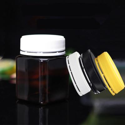 China Custom Printing 400ml Plastic Food Jars square Shape Honey Packaging PET Bottle Recycling for sale