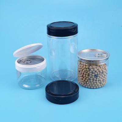 China Flip Top Cap Cashew Nuts Plastic Container Jar 310ml 120g Airtight Clear Candy Cans With Ring Pull Top Lid for sale