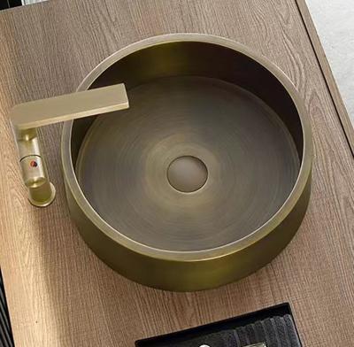 China Material de acero inoxidable de bronce del fregadero SUS304 del cuarto de baño de la sobremesa del color en venta