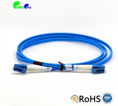 China O remendo blindado da fibra ótica cabografa LC UPC - ligação em ponte azul do cabo de remendo da fibra do duplex 3,0 LSZH da manutenção programada do LC UPC Zipcord à venda