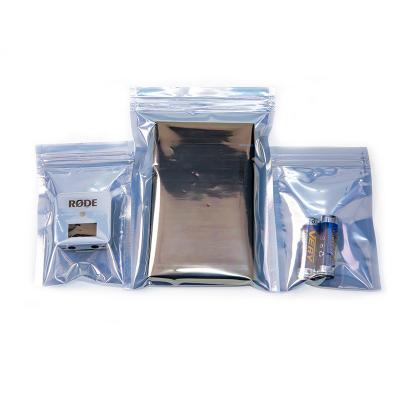 中国 PCBは反静的なESDを袋に入れる真空の貯蔵ペット ピンクPEによって薄板にされたホイル袋を使用した 販売のため