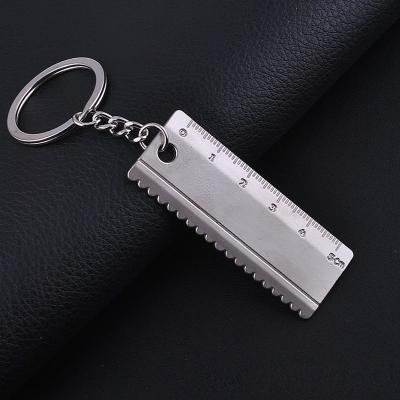 China Souvenir Simulation Tool Series Personality Tools Creative Idea Saw Ruler Universal Key Chain Can Engrave Words en venta