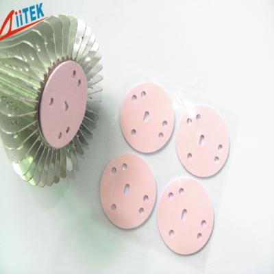 China rosa Silikon-hohe isolierende Kühlkörper-thermische leitfähige Auflagen mit klebender Beschichtung 1,5 W/mK zu verkaufen