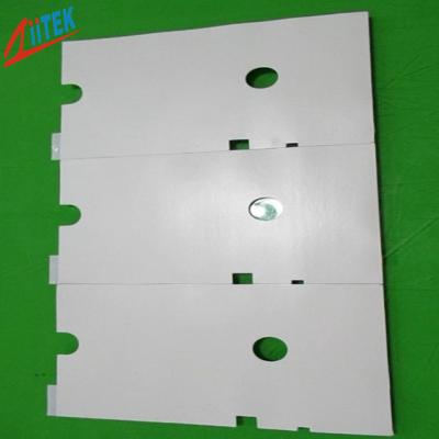 China Reducing The Contact Resistance Adhesive Silicone 27 Shore 00 Grey 1.5W Thermal Gap Pad 1mmT For Routers for sale