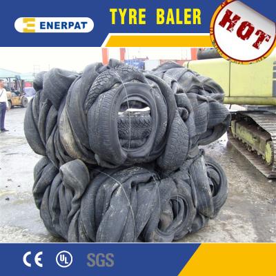 China Automatic Truck Tire Baler/Car Tire Press Baling Machine with UK Brand for sale