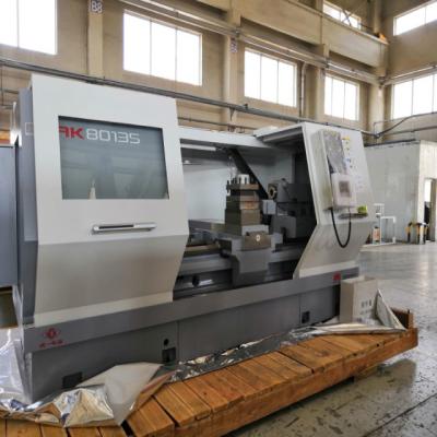 China El torno del CNC del motor servo CAK80285 trabaja a máquina la alta máquina de proceso del metal del esfuerzo de torsión en venta