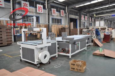 China Automatic Packages Corrugated Carton Box PP Belt Strapping Machine for sale