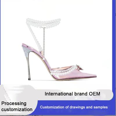 China Fábrica de zapatos de mujer Slingback lujoso elegante moda transparente perla tacones altos en venta