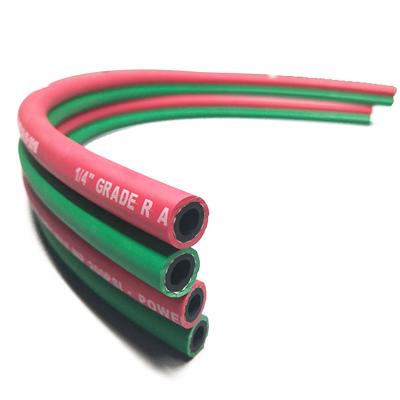 Китай Пожаробезопасное красное/зеленый цвет шланг близнеца ранга р 1/4 дюймов для заварки газа продается