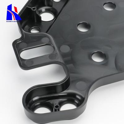 Chine La par injection du PC LEXAN920 moulage le noir chaud de coureur de pièces en plastique brillant à vendre