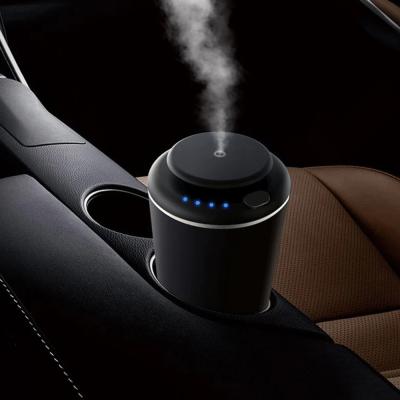 China Portable Electric Aroma Car Air Freshener Auto Scent Mist Nebulizer for sale