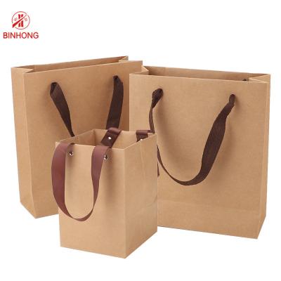 中国 習慣は歪んだハンドルODMクラフト紙袋を大きさで分類する 販売のため