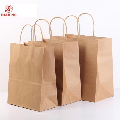 China Reusable Flat Handle Flexo Printing Kraft Paper Carry Bags for sale