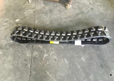China El caucho negro de Caterpillar sigue el peso 55kg con la presión de tierra baja en venta