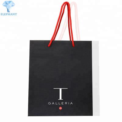 China Large Embossing Printed Paper Carrier Bags With Logo 38×27×10cm for sale