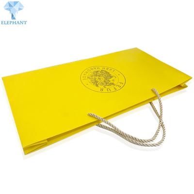 China Handmade Flat Bottom Gold Gift Bags With Handles Hot Stamping for sale