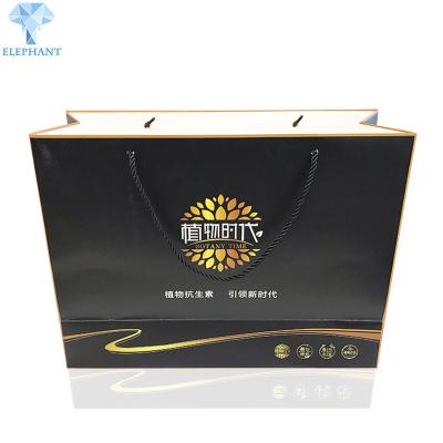 China Fashion Simple C2S Art Paper Sturdy Gift Bags Skincare Paper Takeaway Bags for sale