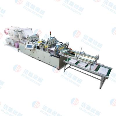 China Máquina de fabricação de sacos de filtro de ar trapezoidal ultra-sônico externo de 12 kW XL-7002 à venda