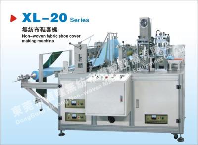 China 220V Plastic Shoe Cover Manufacturing Machine Links- en rechtszijdse aanpassing tijdens de materiaalroloperatie Te koop