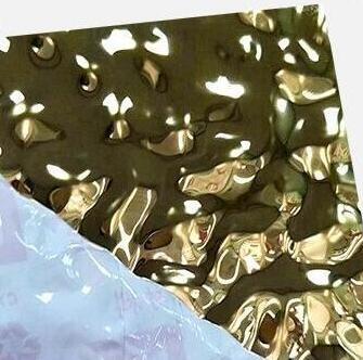 Chine Hôtel décoratif martelé de plat de feuille d'ondulation de Rose Gold Stainless Steel Water de panneau en métal à vendre