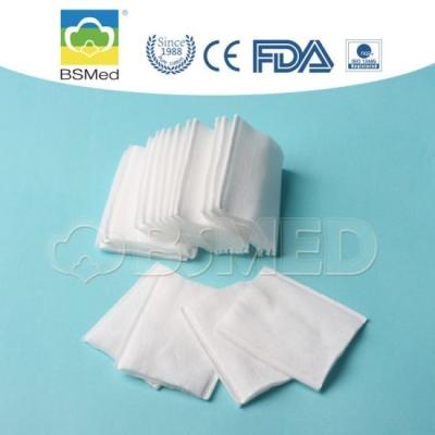 China As almofadas de algodão cosméticas orgânicas para o exame médico/ferida importam-se molhos à venda