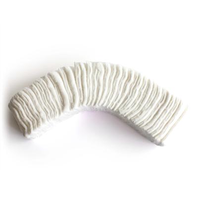 中国 衛生学の使い捨て可能な100gジグザグ形の原綿のドレッシング 販売のため