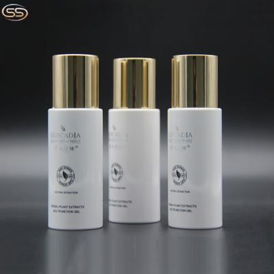 China Screen Printing Handling 50ml Plastic Cosmetic Toner Bottle with Golden Cap for sale