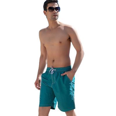 China Men's Quick Dry Woven Beach Pants Solid Color Five Minute Shorts Surf Swim Vacation for sale