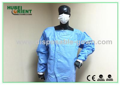 China Blood Proof Blue Disposable Dental Gowns/Tyvek Protective Clothing with knitted wrist for sale