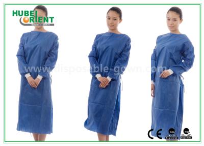 China Non-woven or SMS Blue Disposable Hospital Scrubs With Elastic And Knit Cuff for sale
