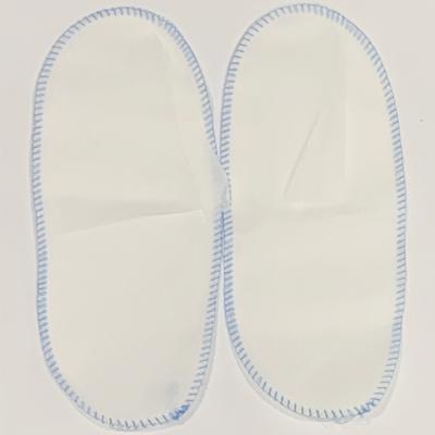中国 Adult Disposable Nonwoven Close Slippers With Whole Top Lightweight PP Blue Thread Sewing 販売のため